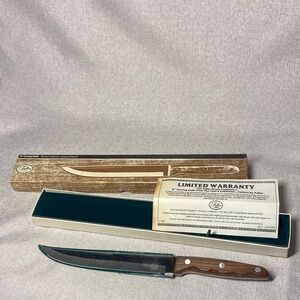 Vintage Fuller Brush Company 8” carving knife — new in original box.
